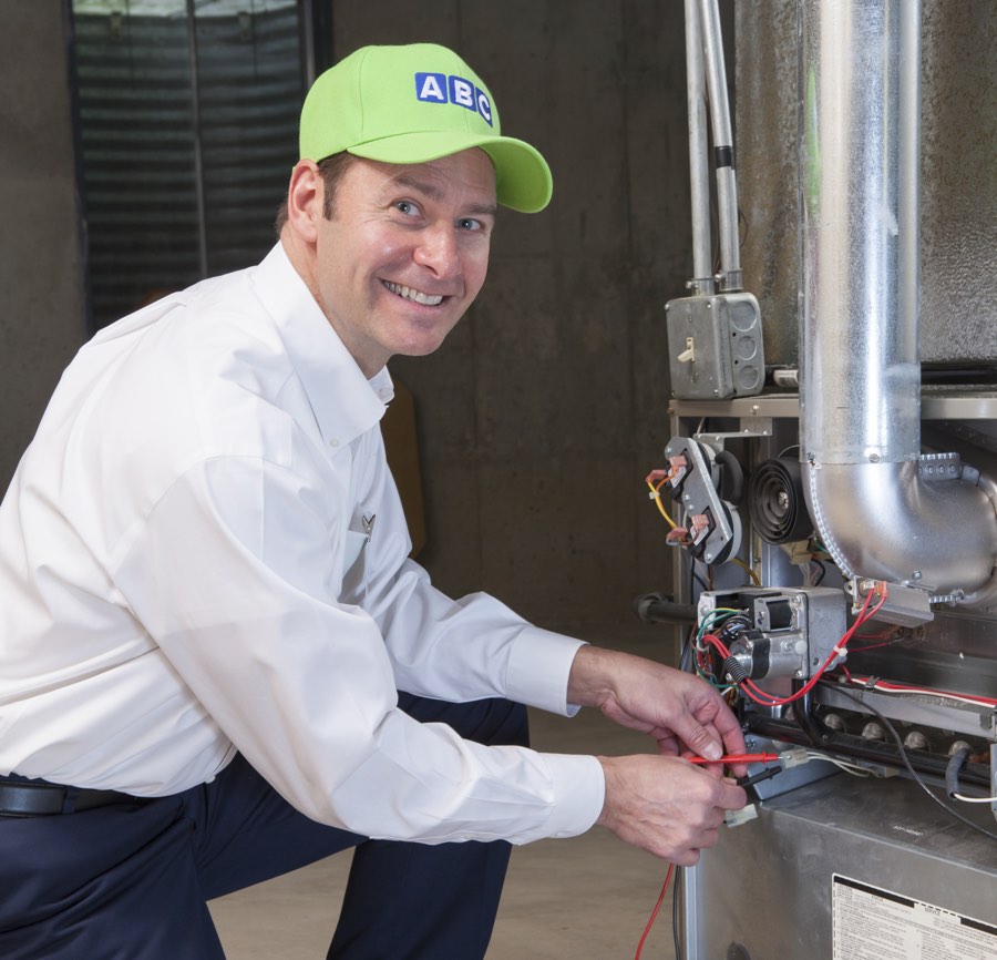 ABC technician testing a furnace during a tune-up