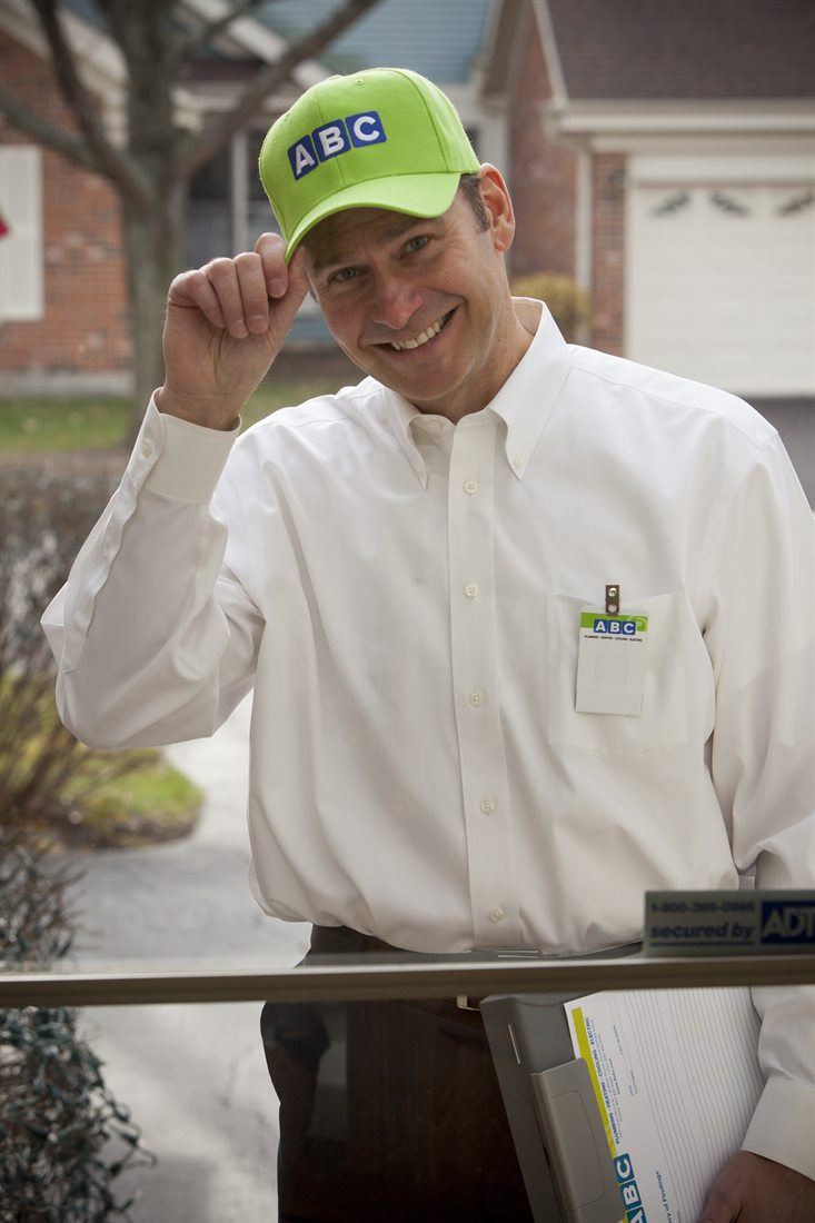 Friendly ABC technician arriving at a Chicagoland home
